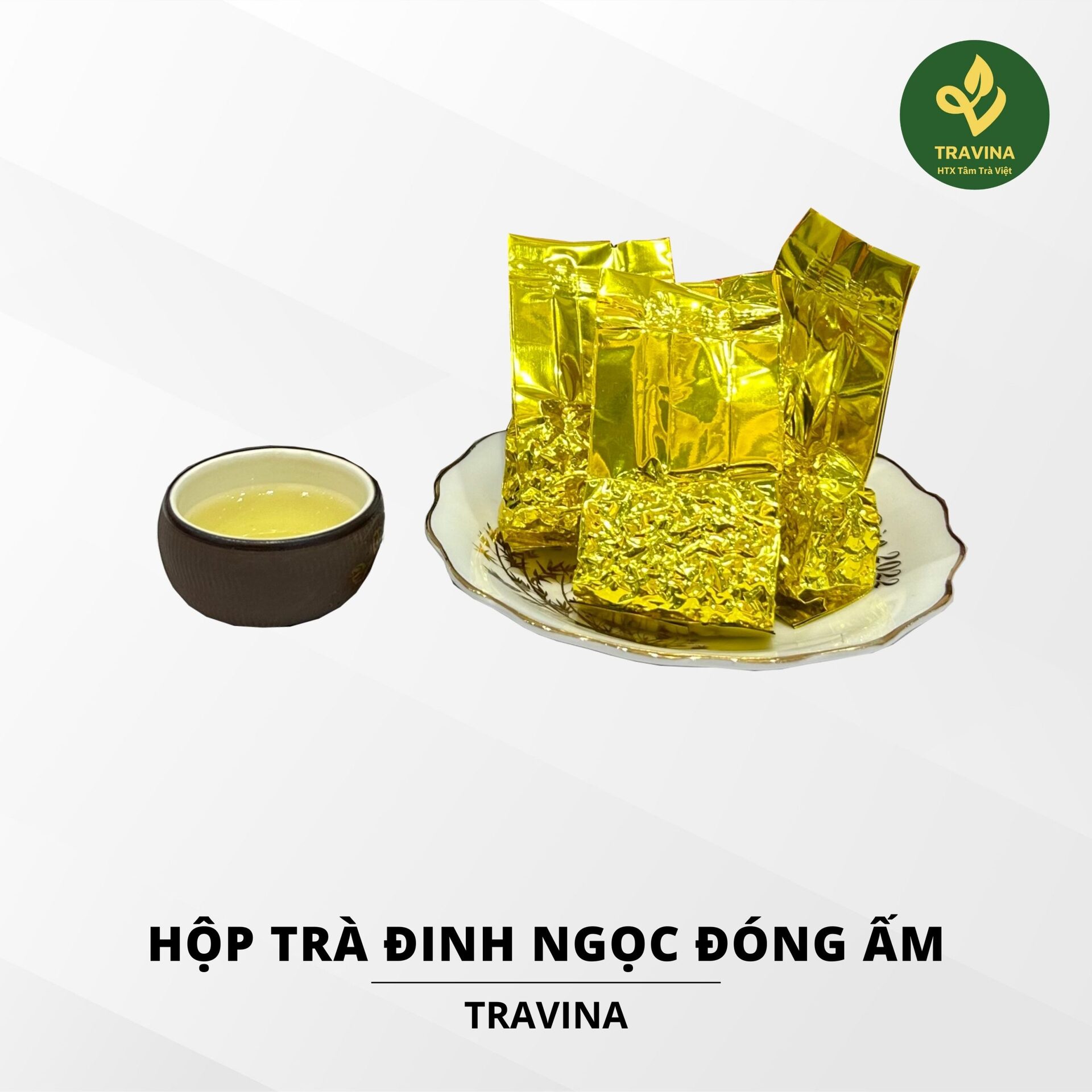 Gói ấm Trà Đinh Ngọc bên chén trà
