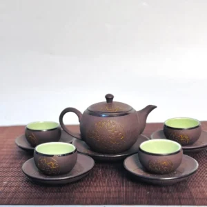 Bộ ấm Ngũ Ẩm Ẩn Liên - Bộ ấm chén Bát Tràng cao cấp – HTX Tâm Trà Việt Trọn bộ ấm chén Ngũ Ẩm Ẩn Liên tử sa Bát Tràng trên chiếu tre – TRAVINA